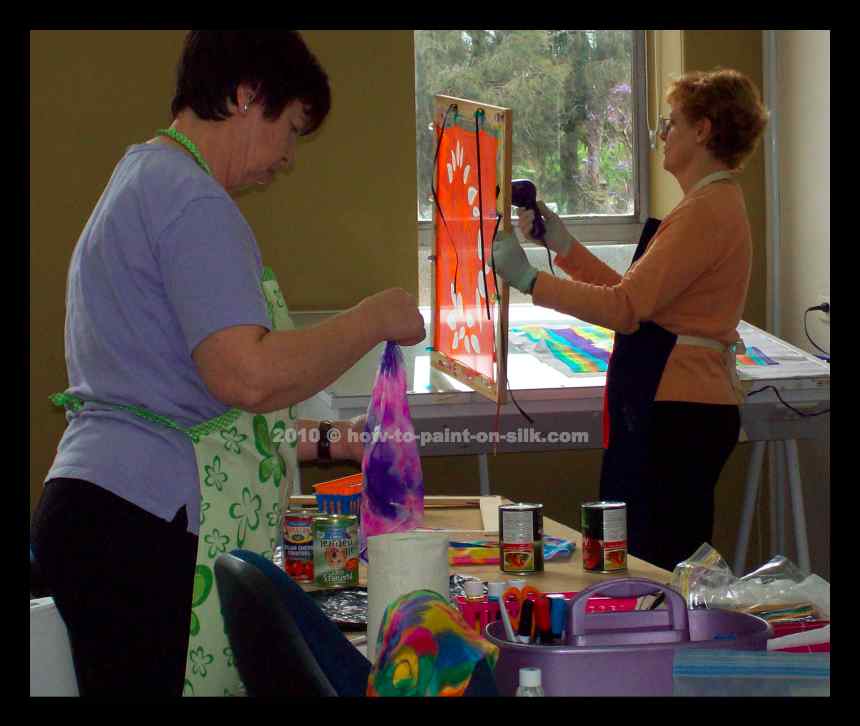http://how-to-paint-on-silk.com/uploads/images/class-photos/how-to-paint-on-silk-students-hairdryer.jpg