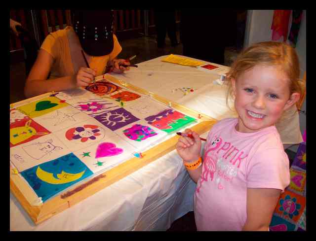 Miss Pink learning how to paint on silk with Teena Hughes