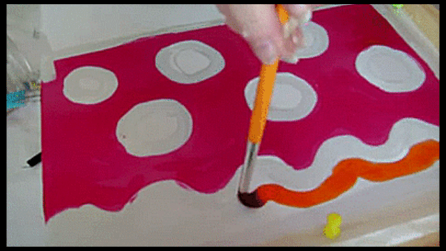 Hand painting on silk hot pink and orange with cold wax